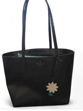 kate spade black leather tote with branded daisy charm & dust bag